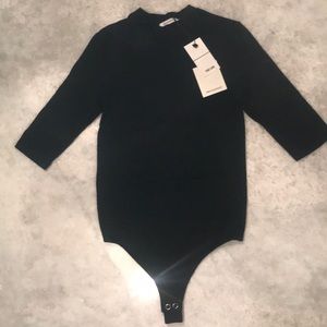Protagonist Black Mock Neck Thong Bodysuit